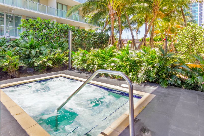 Luxury spa and hot tub surrounded by lush tropical gardens